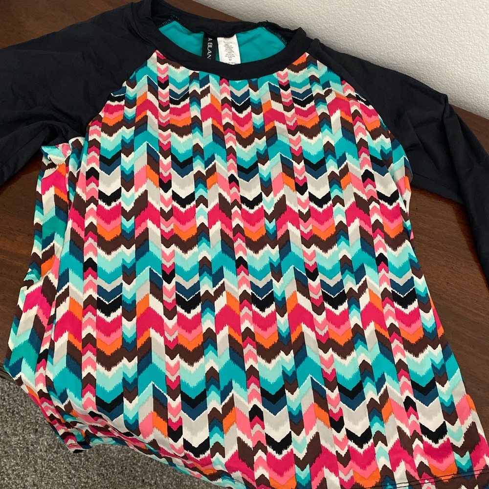 La Blanca swim top rash guard